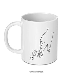 Minimalistic Hand Holding Tiny Carrot Art Mug product