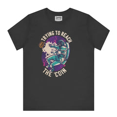 Trying to Reach the Coin graphic t-shirt product